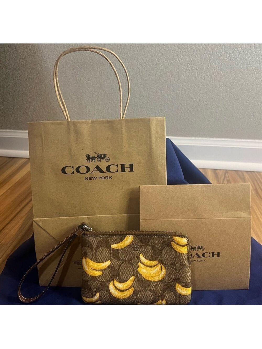 Coach BANANAS Wristlet with box and bag NWOT